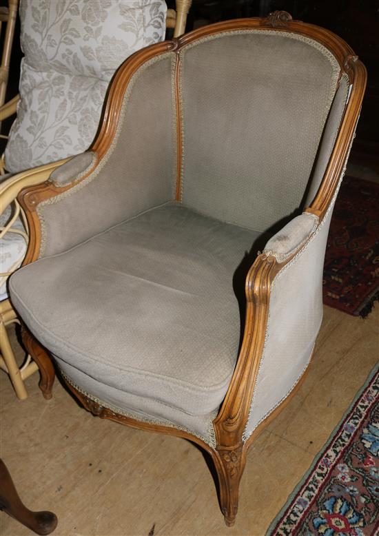 Late 19th century French beech framed enclosed bergere armchair